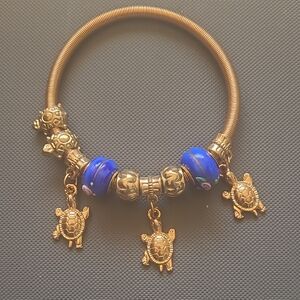 Charming Gold and Blue Turtle Bracelet